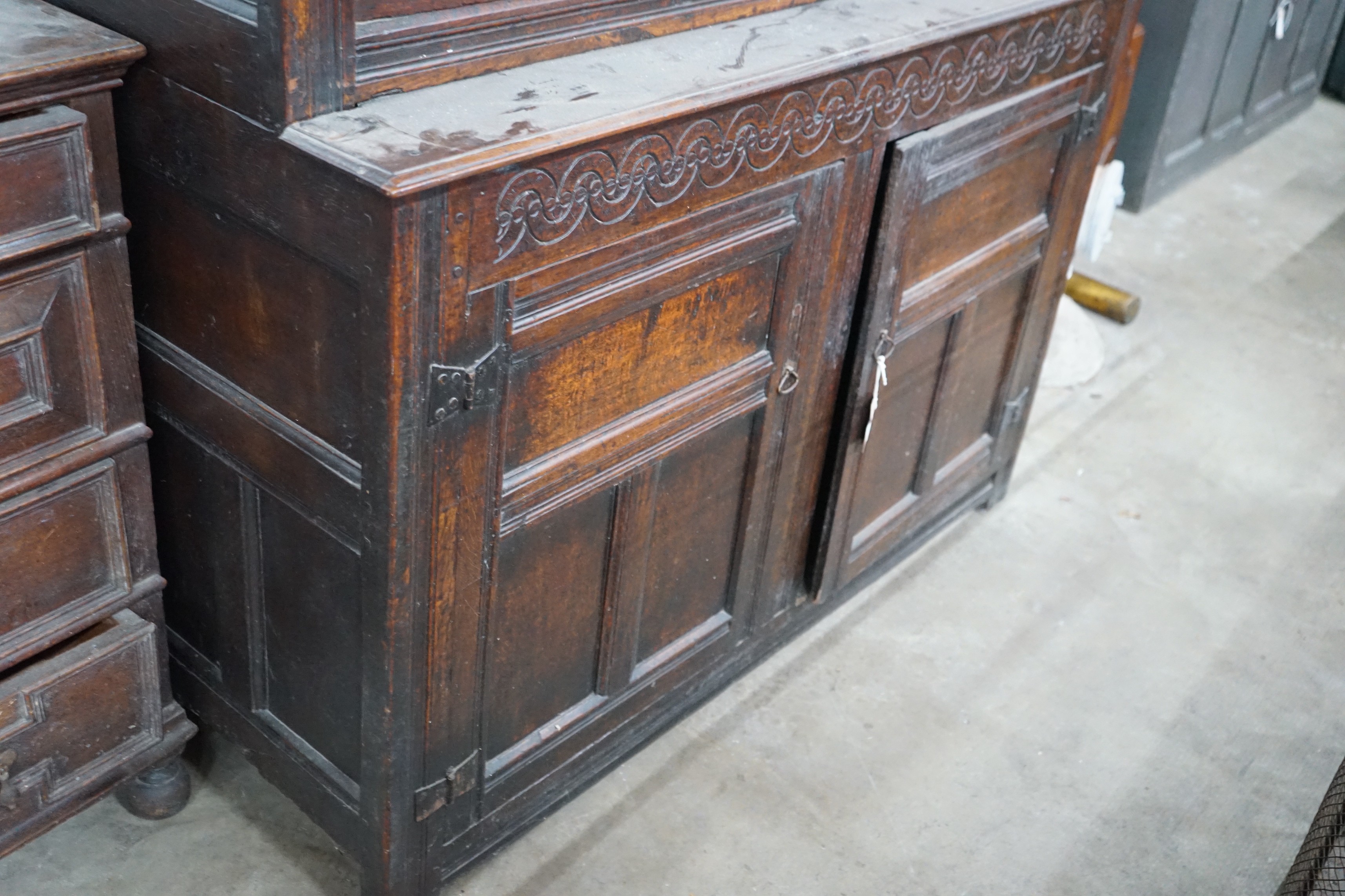 A 17th century oak court cupboard, width 139cm, depth 57cm, height 146cm